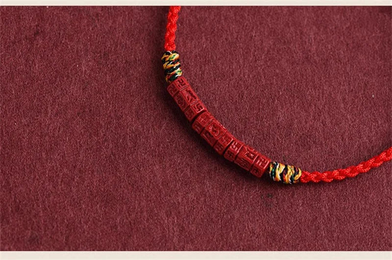 Cinnabar and Sanskrit Six-Syllable Mantra Red String Bracelet - Brings Protection, Wisdom, and Faith.